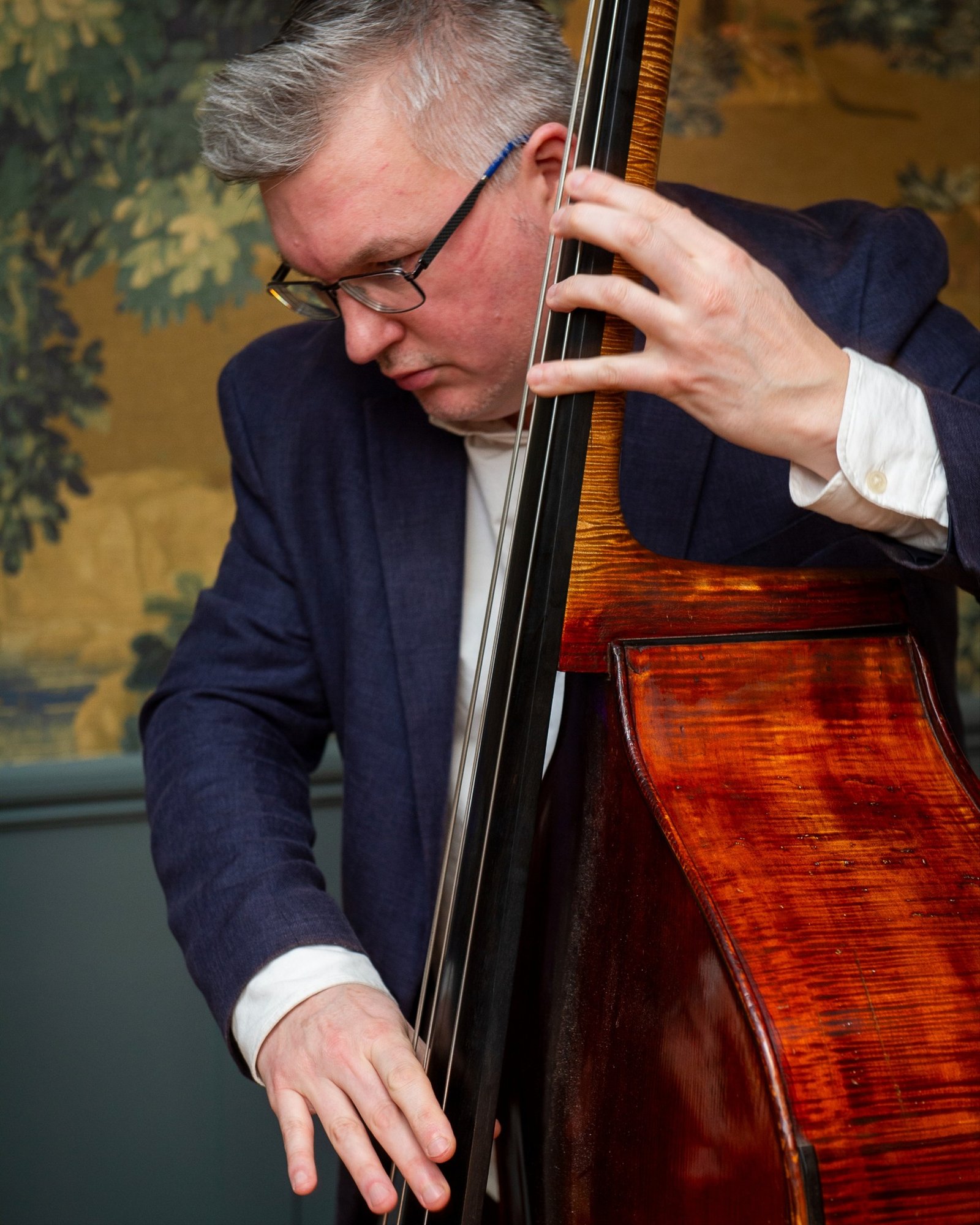 Double bass musician performing at Eighteen
