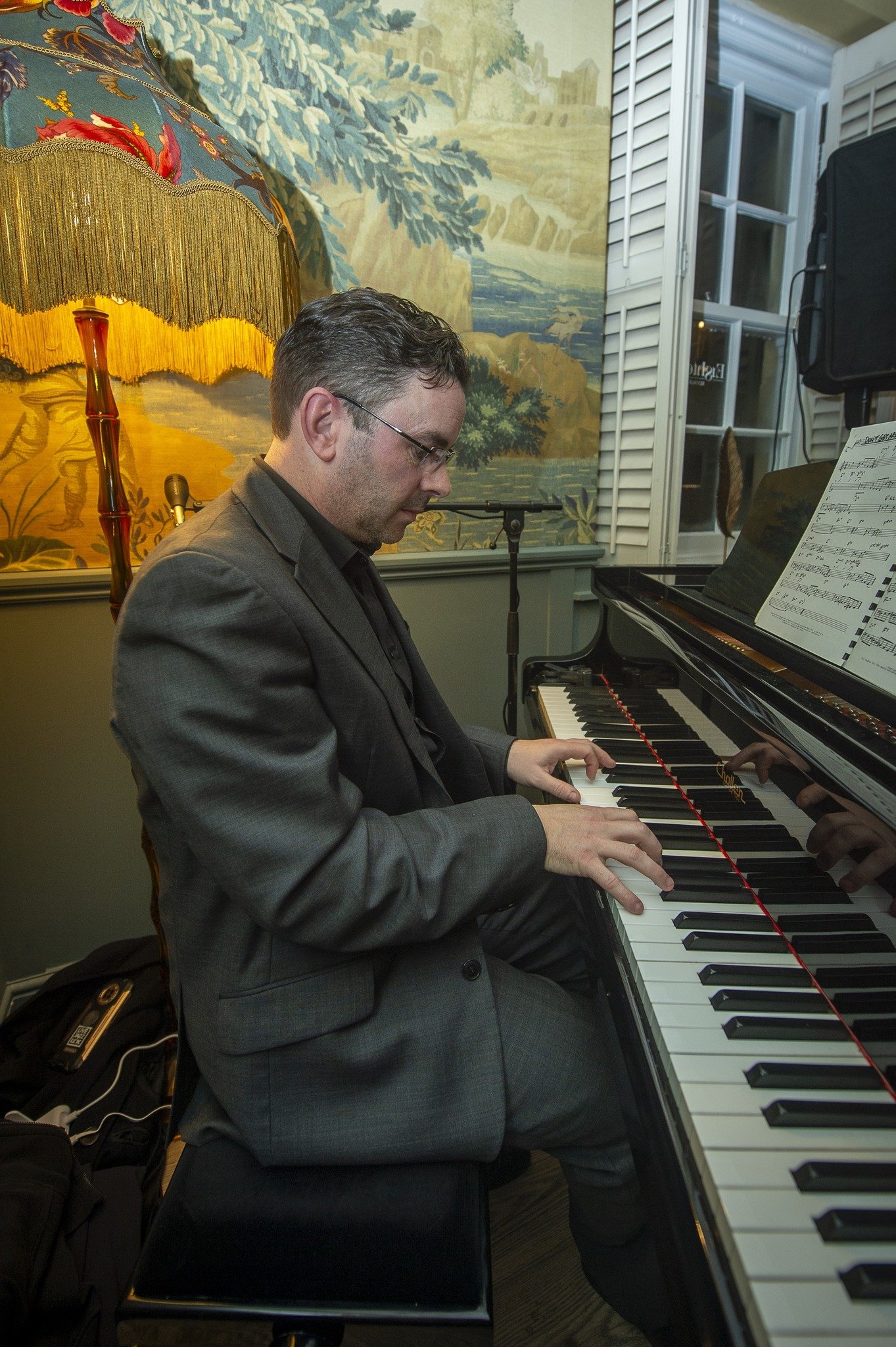 Piano player performing live at Eighteen
